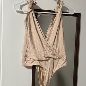 Lulu's Beige Knot-Shoulder Surplice Bodysuit